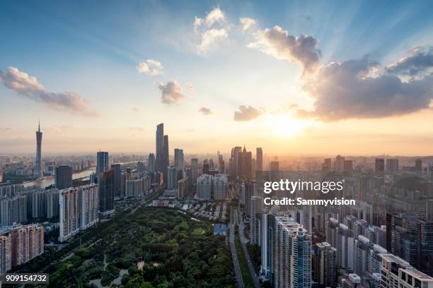 sunset in guangzhou - guangzhou stock pictures, royalty-free photos & images