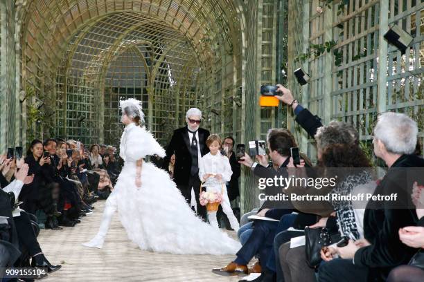 Stylist Karl Lagerfeld and his Godson Hudson Kroenig walk the runway at the end of the Chanel Haute Couture Spring Summer 2018 show as part of Paris...