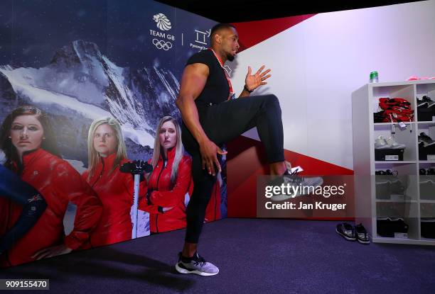Joel Fearon tries on his trainers during the Team GB Kitting Out Ahead Of Pyeongchang 2018 Winter Olympic Games at Adidas headquarters on January 23,...