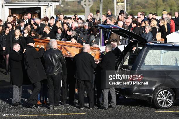 The coffin of Dolores O'Riordan is carried out of St Ailbe's parish church in Ballybricken after the funeral on January 23, 2018 in Limerick,...