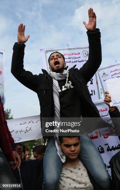 Palestinian students take part in a protest in Gaza City on January 23, 2018 against US President Donald Trump's decision to recognise Jerusalem as...