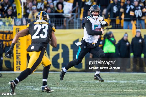 Blake Bortles of the Jacksonville Jaguars calls out a block while running with the ball during the second half of the AFC Divisional Playoff game...