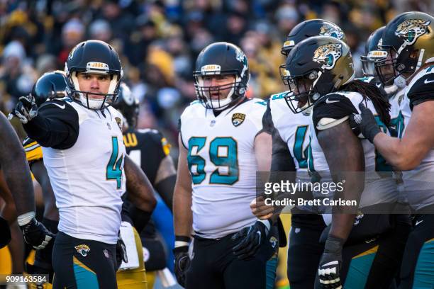 Josh Lambo of the Jacksonville Jaguars points in celebration during the second half of the AFC Divisional Playoff game against the Pittsburgh...