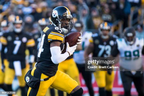 Antonio Brown of the Pittsburgh Steelers runs for yards after reception during the second half of the AFC Divisional Playoff game against the...