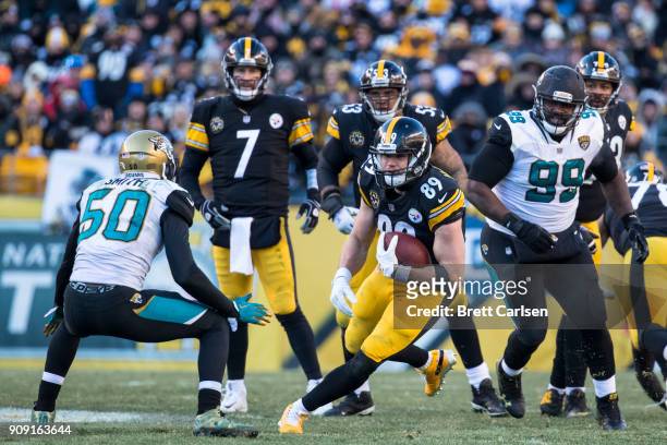 Vance McDonald of the Pittsburgh Steelers carries the ball during the second half of the AFC Divisional Playoff game against the Jacksonville Jaguars...