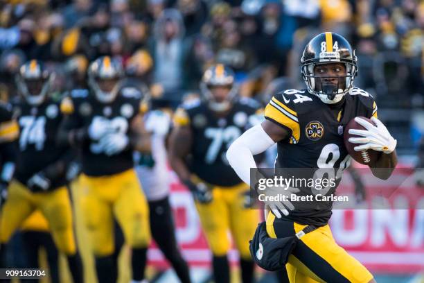 Antonio Brown of the Pittsburgh Steelers runs for yards after reception during the second half of the AFC Divisional Playoff game against the...