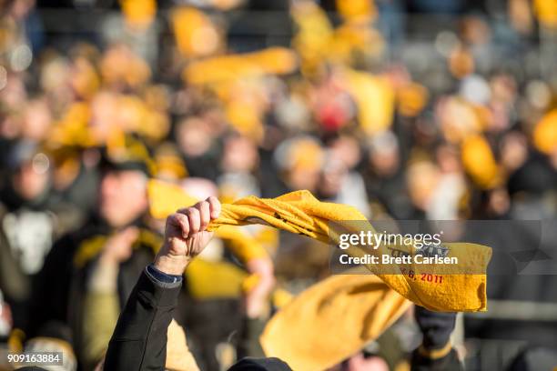 Pittsburgh Steelers fans waive terrible towels during the AFC Divisional Playoff game against the Jacksonville Jaguars at Heinz Field on January 14,...