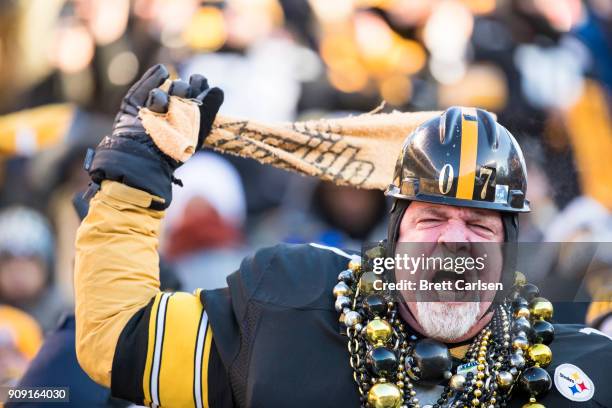 Pittsburgh Steelers fan cheers during the AFC Divisional Playoff game against the Jacksonville Jaguars at Heinz Field on January 14, 2018 in...
