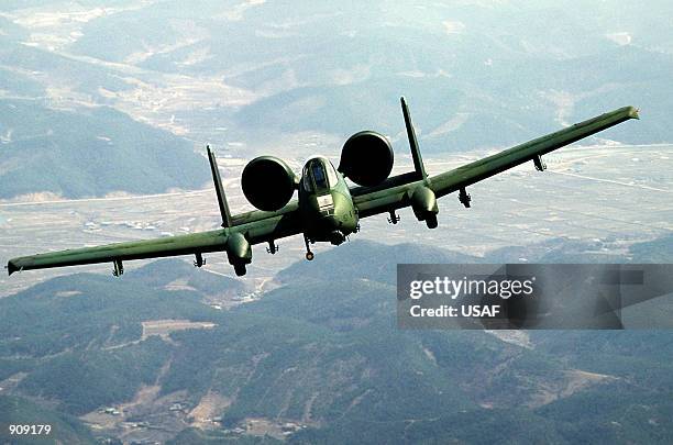 An air-to-air front view of a 25th Tactical Fighter Squadron A-10 Thunderbolt II aircraft during Exercise Team Spirit ''86.