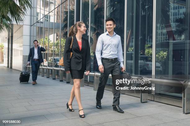 People Walking Past Office Building Photos and Premium High Res ...