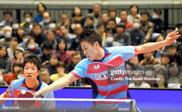 Yuya Oshima and Jun Mizutani compete in the Men's Doubles final against Jin Ueda and Masaki Yoshida during day six of the All Japan Table Tennis...