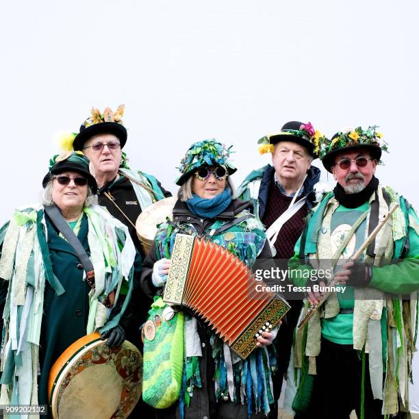 Portrait of the Makara Morris musicians wearing traditional costume at an orchard-visiting wassail at Sledmere House in the Yorkshire Wolds, United...