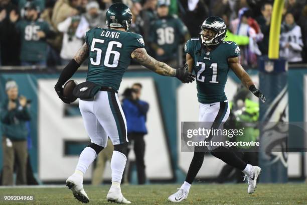 Philadelphia Eagles defensive end Chris Long and Philadelphia Eagles cornerback Patrick Robinson celebrate a fumble recovery during the NFC...