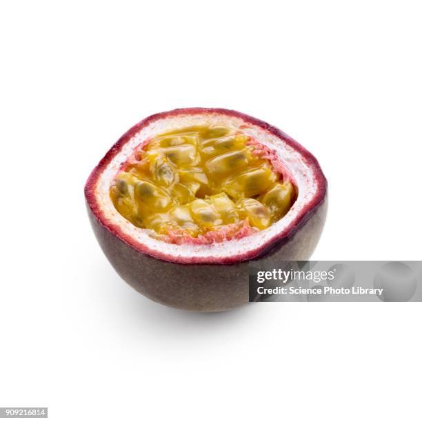 half a passionfruit - maracuja stock-fotos und bilder