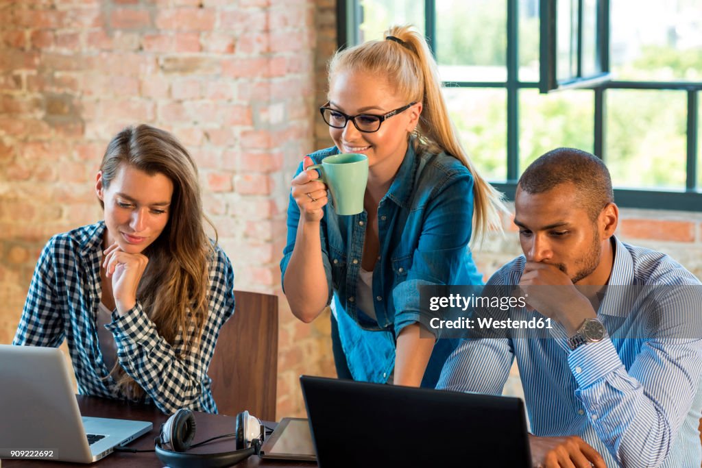 Young business people in office preparing foundation of a start-up company