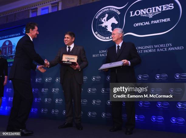 Edouard de Rothschild, President of France Galop receives the Longines Longines Worlds Best Horse Race Award from Mr. Juan-Carlos Capelli, Vice...