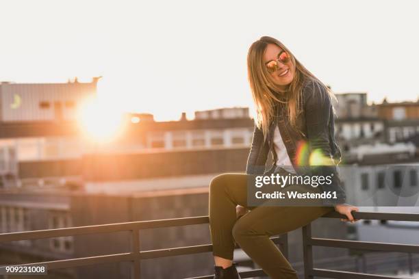 Sitting Railing 13,612 Sitting On Railing Stock Photos, High-Res Pictures, and Images ...