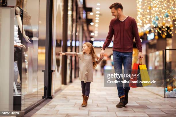 a day in the mall - christmas children stock pictures, royalty-free photos & images