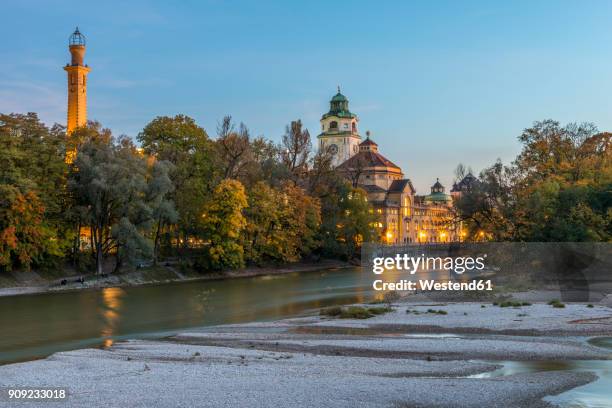 germany, bavaria, munich, river isar and muellersches volksbad in autumn - munich landmarks stock pictures, royalty-free photos & images