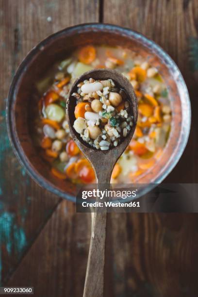 spoon and mediterranean soup - soup vegtables stock-fotos und bilder