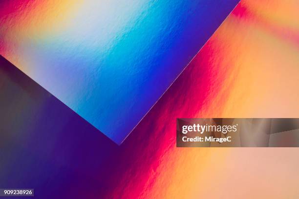 holographic paper and spectrum pattern - toned image stock pictures, royalty-free photos & images