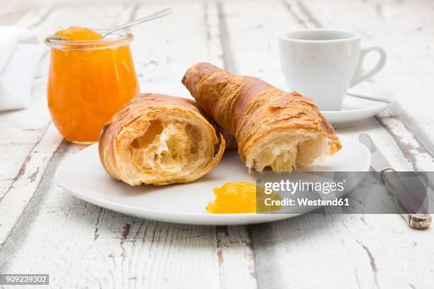 croissant breakfast, apricot jam and cup of coffee - croissant jam stock pictures, royalty-free photos & images