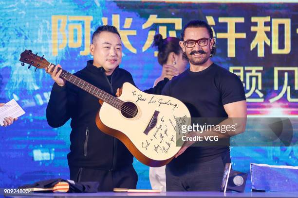 Bollywood actor Aamir Khan and former Chinese table tennis player Liu Guoliang attend 'Secret Superstar' press conference on January 23, 2018 in...