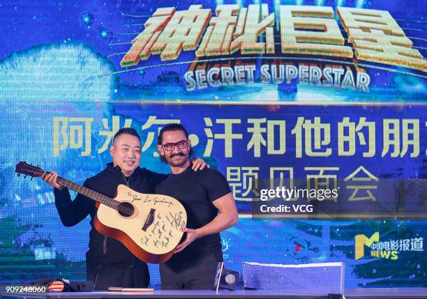 Bollywood actor Aamir Khan and former Chinese table tennis player Liu Guoliang attend 'Secret Superstar' press conference on January 23, 2018 in...