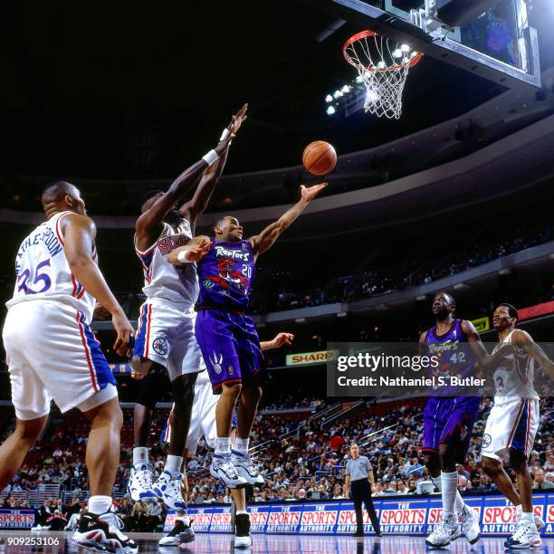 Damon Stoudamire of the Toronto Raptors shoots during a game played on January 29, 1997 at the First Union Arena in Philadelphia, Pennsylvania. NOTE...