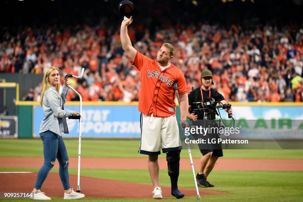 Houston Texans player J.J. Watt throws out the ceremonial first pitch prior to Game 3 of the 2017 World Series between the Los Angeles Dodgers and...