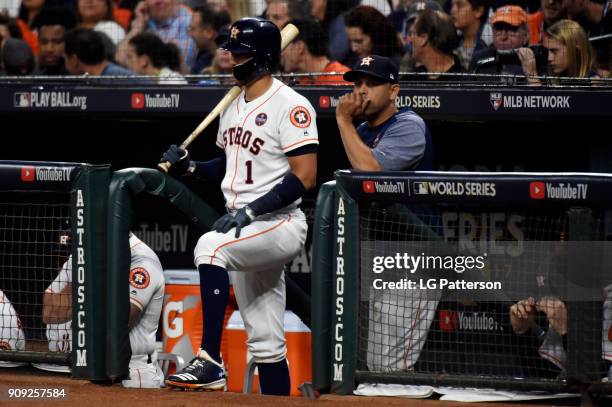 Carlos Correa of the Houston Astros looks on from the dugout during Game 3 of the 2017 World Series against the Los Angeles Dodgers at Minute Maid...