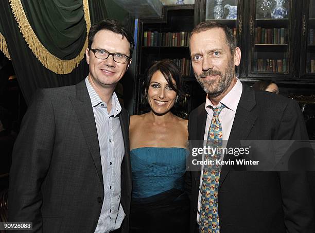 Fox TV's Peter Rice, actors Lisa Edelstein and Hugh Laurie pose at the afterparty for Fox TV's season 6 premiere of "House" at the Green Door on...