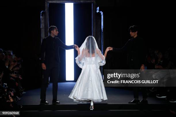 Model presents a creation by Julien Fournie during the 2018 spring/summer Haute Couture collection fashion show on January 23, 2018 in Paris.