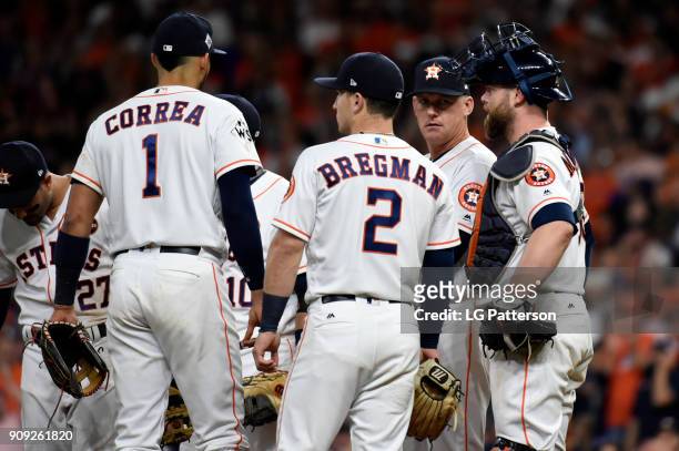 Manager A.J. Hinch of the Houston Astros makes a pitching change during Game 3 of the 2017 World Series against the Los Angeles Dodgers at Minute...