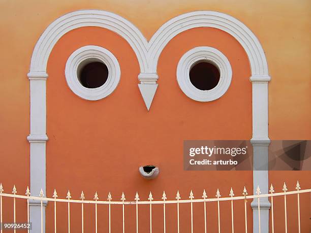 friendly smiling temple - anthropomorphic face stock pictures, royalty-free photos & images