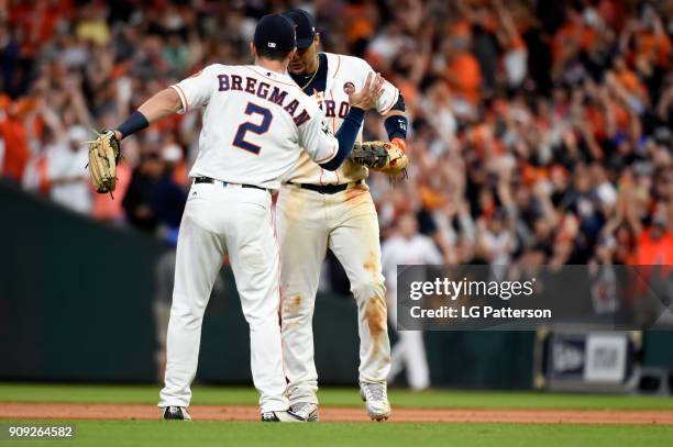 Alex Bregman and Yuli Gurriel of the Houston Astros celebrate after the Astros defeated the Los Angeles Dodgers in Game 3 of the 2017 World Series at...