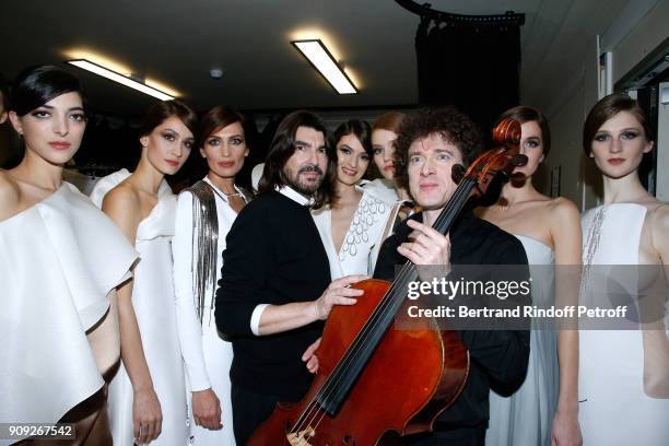 Stylist Stephane Rolland, Violoncellist Francois Salque and Models pose after the Stephane Rolland Haute Couture Spring Summer 2018 show as part of...