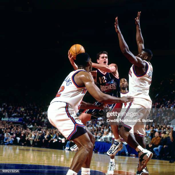 Matt Maloney of the Houston Rockets shoots during a game played on February 4, 1997 at Madison Square Garden in New York City . NOTE TO USER: User...