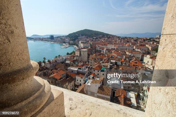split's historic diocletian's palace, old town and marjan hill in croatia viewed from above from a tower on a sunny day. - croatia stock pictures, royalty-free photos & images