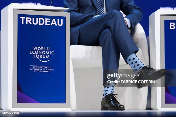 Canadian Prime Minister Justin Trudeau's polka dot socks are seen during the annual World Economic Forum on January 23, 2018 in Davos, eastern...