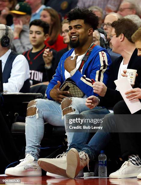 Running back Ezekiel Elliot of the Dallas Cowboys courtside during a game between the Golden State Warriors and the Houston Rockets at Toyota Center...