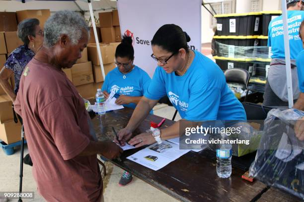 puerto rico recovery, dec., 2017 - 2017 hurricane maria stock pictures, royalty-free photos & images