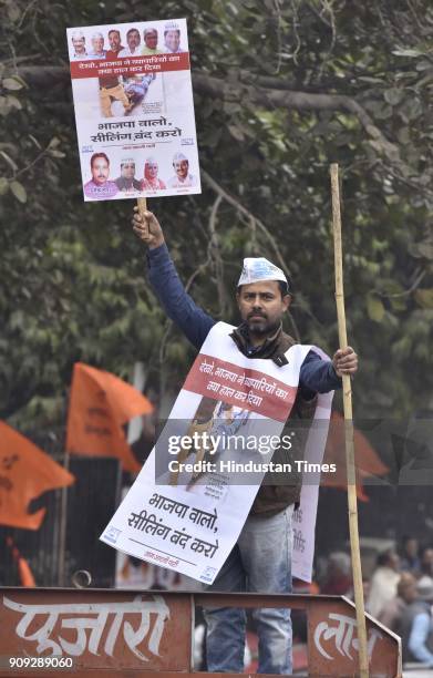 Workers participate in a protest march at Town Hall, Chandni Chowk, keeping with the call for a Delhi Bandh made by Confederation of All India...