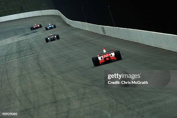 Helio Castroneves, drives the Team Penske Dallara Honda during practice for the IndyCar Series Bridgestone Indy Japan 300 Mile on September 18, 2009...