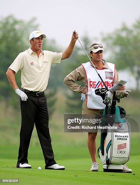 Richard Green of Australia selects a club from his bag during the second round of the Austrian Golf Open at Fontana Golf Club on September 18, 2009...