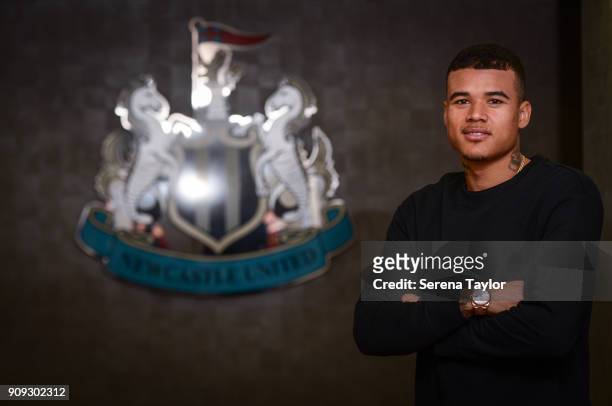 Kenedy poses for photographs with the club crest at St.James' Park on January 23 in Newcastle, England.