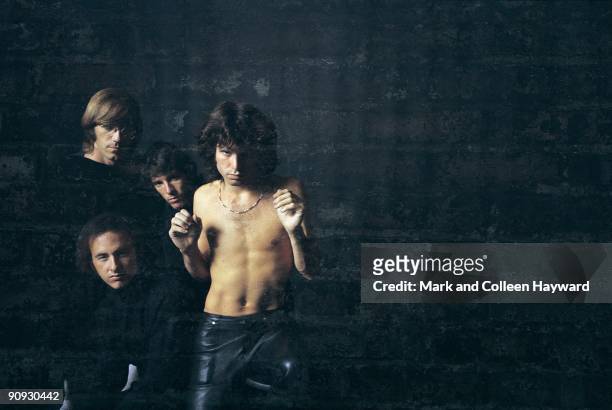 American rock band The Doors pose for their first album cover, 1967. They are vocalist Jim Morrison, keyboardist Ray Manzarek, drummer John Densmore,...