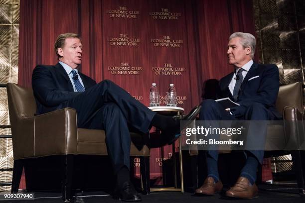 Roger Goodell, commissioner of the National Football League , left, speaks with Terry Lundgren, chairmain of Macy's Inc., during an Economic Club of...