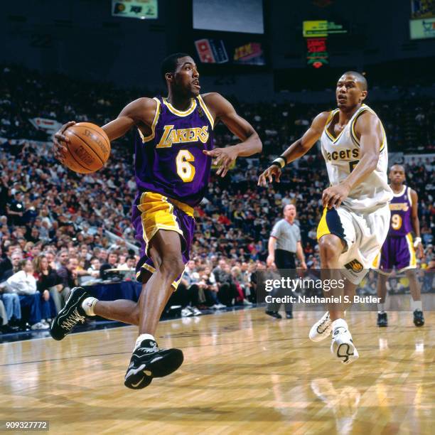 Eddie Jones of the Los Angeles Lakers drives during a game played on March 2, 1997 at Market Square Garden in Indianapolis, Indiana. NOTE TO USER:...