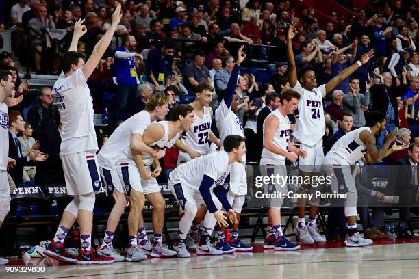 The Pennsylvania Quakers erupt after a three point basket during the second half at The Palestra on January 20, 2018 in Philadelphia, Pennsylvania....